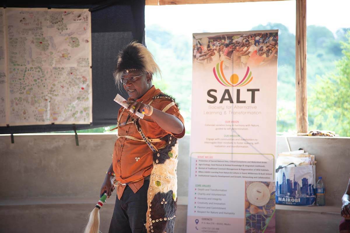 Simon Mitambo leads a community discussion at the restored Gaaru in Tharaka. Photo: Rory Sheldon
